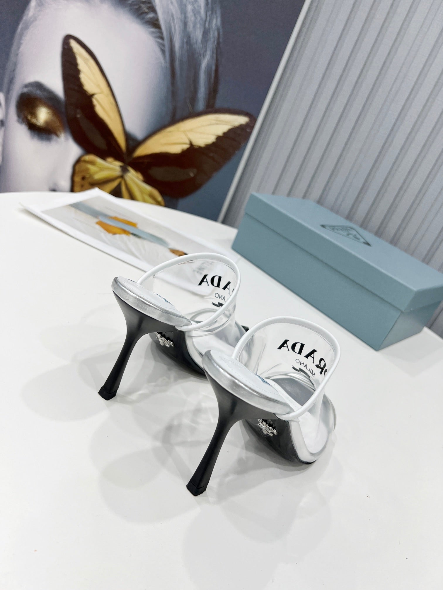 [TOP] PRADA Logo-print Plexiglas High-heel Slides - White