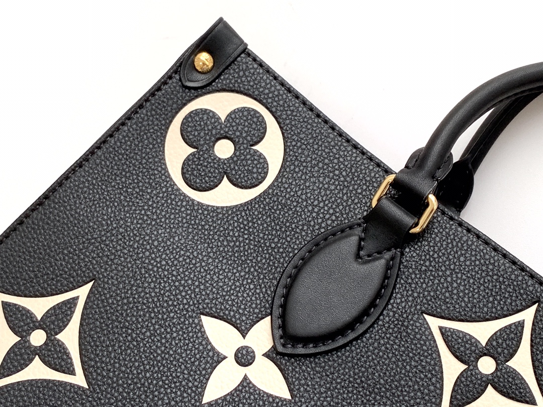 [TOP] Louis Vuitton LV On The Go Empreinte 2 Tones Tote MM 34.0 x 26.0 x 13.0 cm - Black and Cream