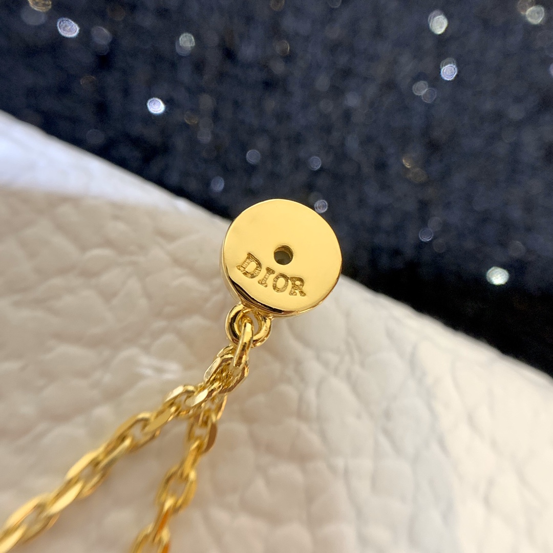 [TOP] Christian Dior tasseled pearl stard earrings - Gold