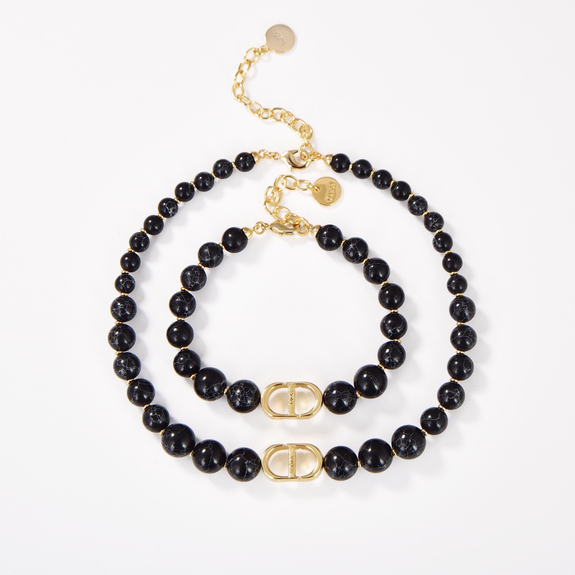 [TOP] Christian Dior bracelet in gold plated metal and black crystals bracelet/necklace