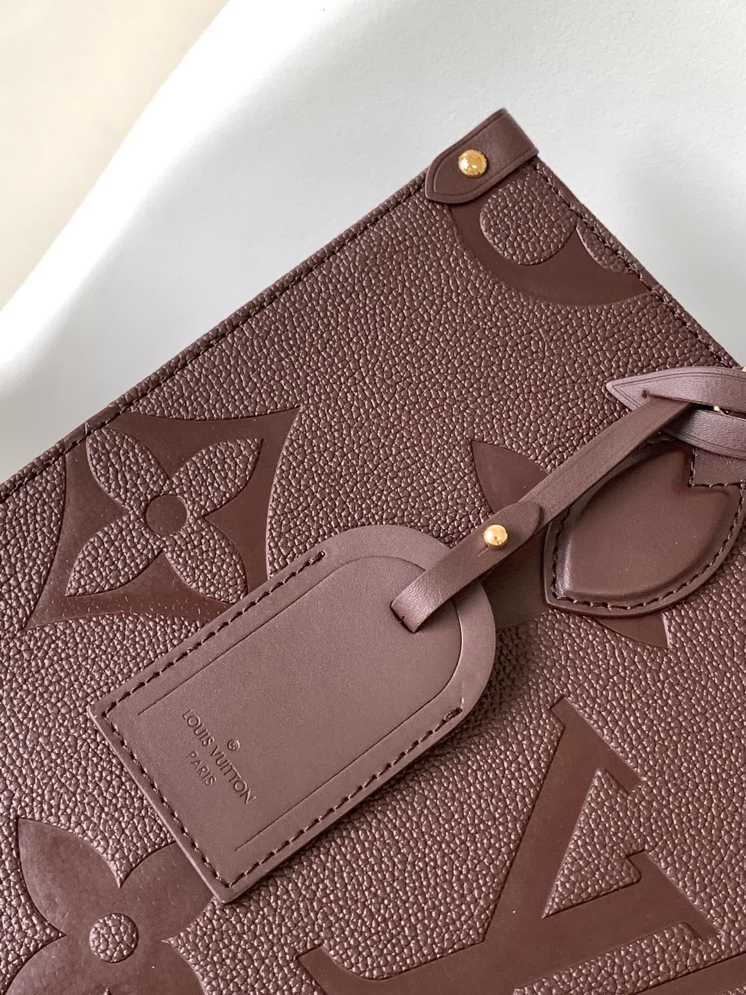 [TOP] Louis Vuitton LV L*V Monogram Empreinte On The Go Bag - Jujube Red - 35x27x14cm