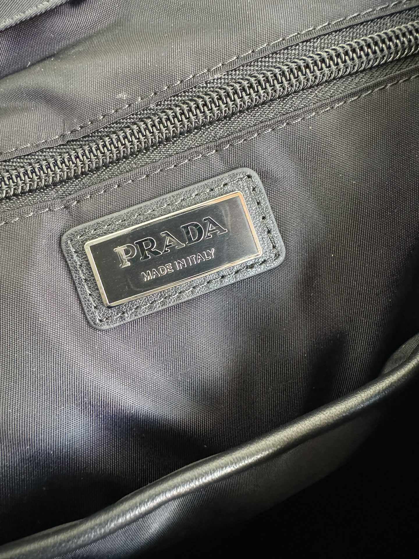 [TOP] PRADA Recycled Nylon Fabric And Glossy Leather Integrated Backpack 27x45x7cm - Black