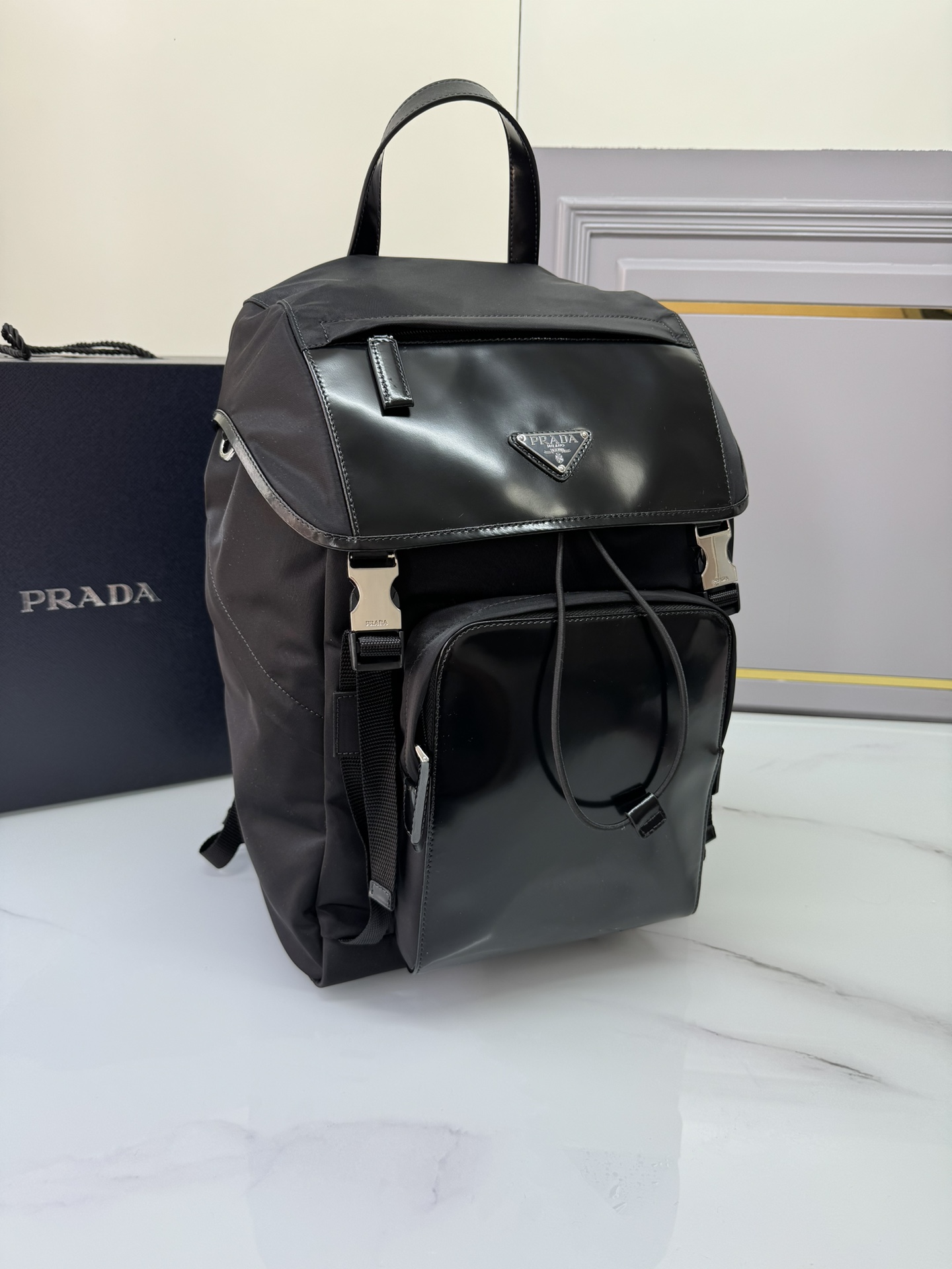 [TOP] PRADA Recycled Nylon Fabric And Glossy Leather Integrated Backpack 27x45x7cm - Black