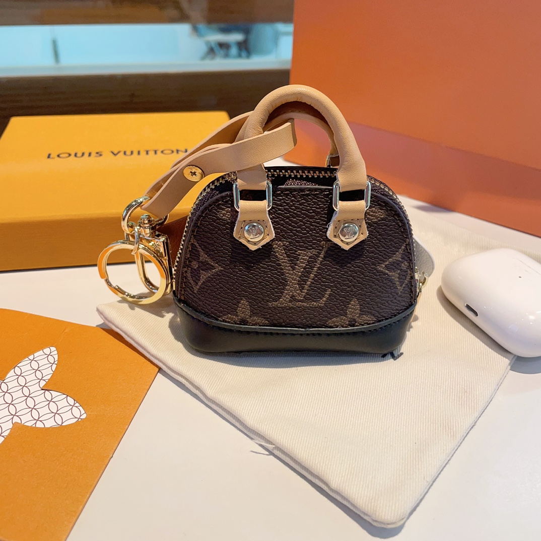 [TOP] Louis Vuitton LV Mini Puppy/Elephant Shell Bag Keychain - Brown
