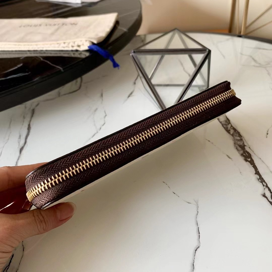 [TOP] Louis Vuitton LV LV Zippy Wallet Empreinte Crafty 2 Tones - Cream