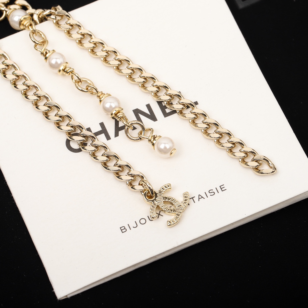 [TOP] CHANEL Black Oval Pearl Tassel Earrings