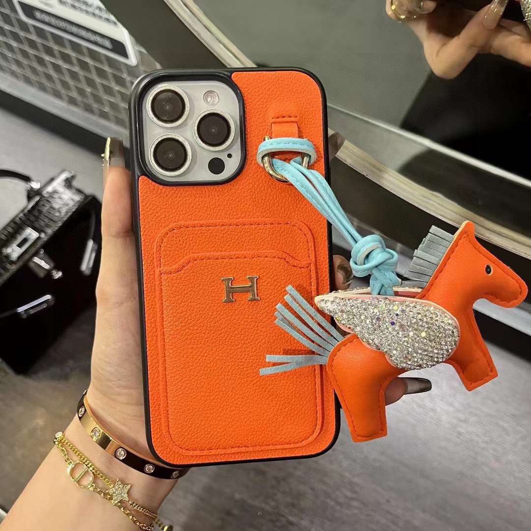 [TOP] HERMES iPhone Phone Case With Pony Pendant - 2 Colors