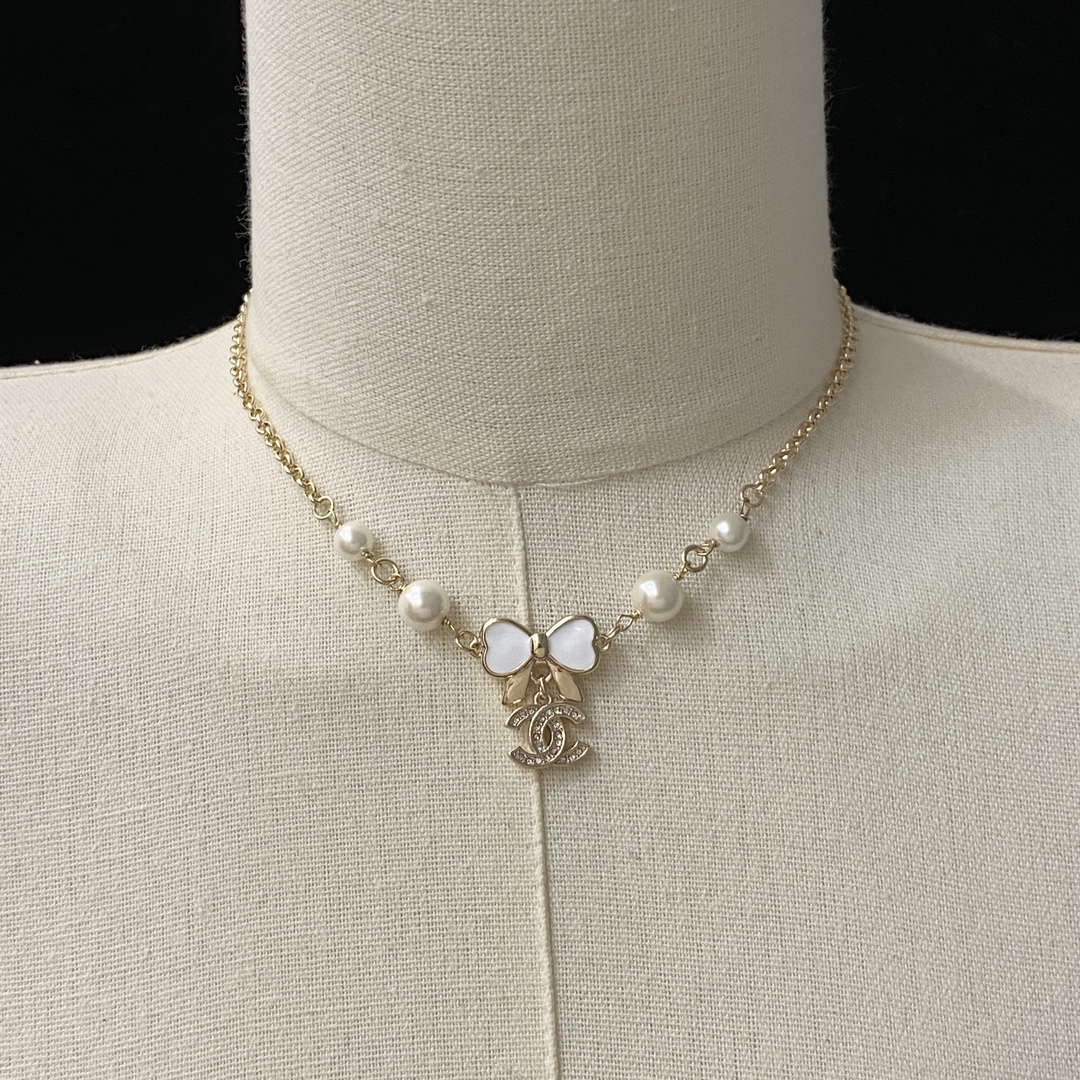 [TOP] CHANEL CC Pearl Necklace with Bow - Gold