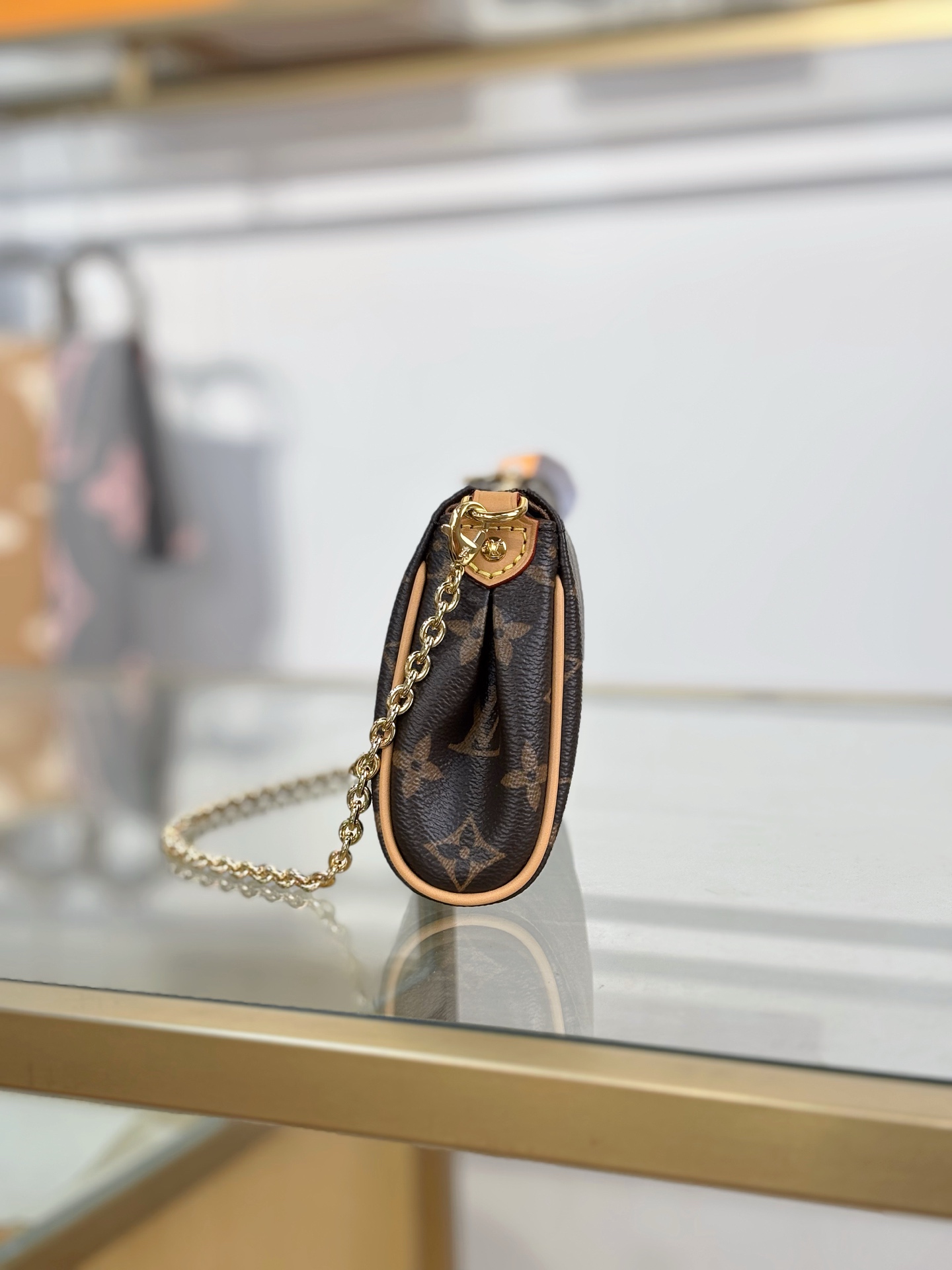 [TOP] Louis Vuitton LV Pochette Eva Monogram 27x11x5cm - Brown