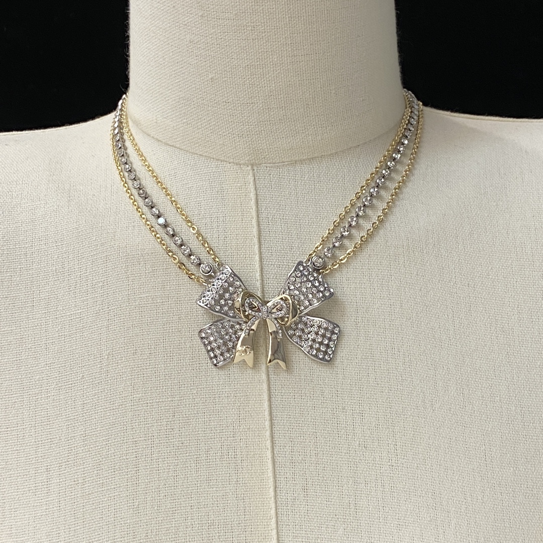 [TOP] CHANEL Bow Necklace - Gold and Silver
