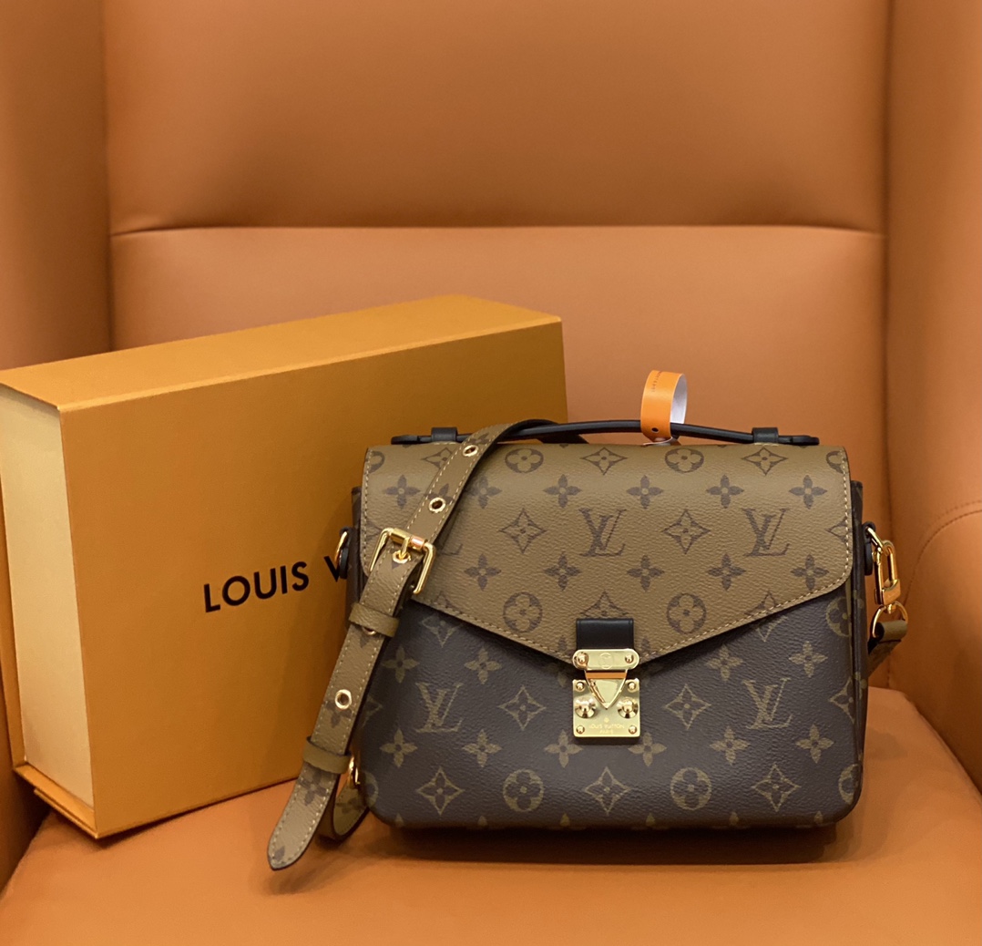 LOUIS VUITTON coated canvas with cowhide trim underarm shoulder ...