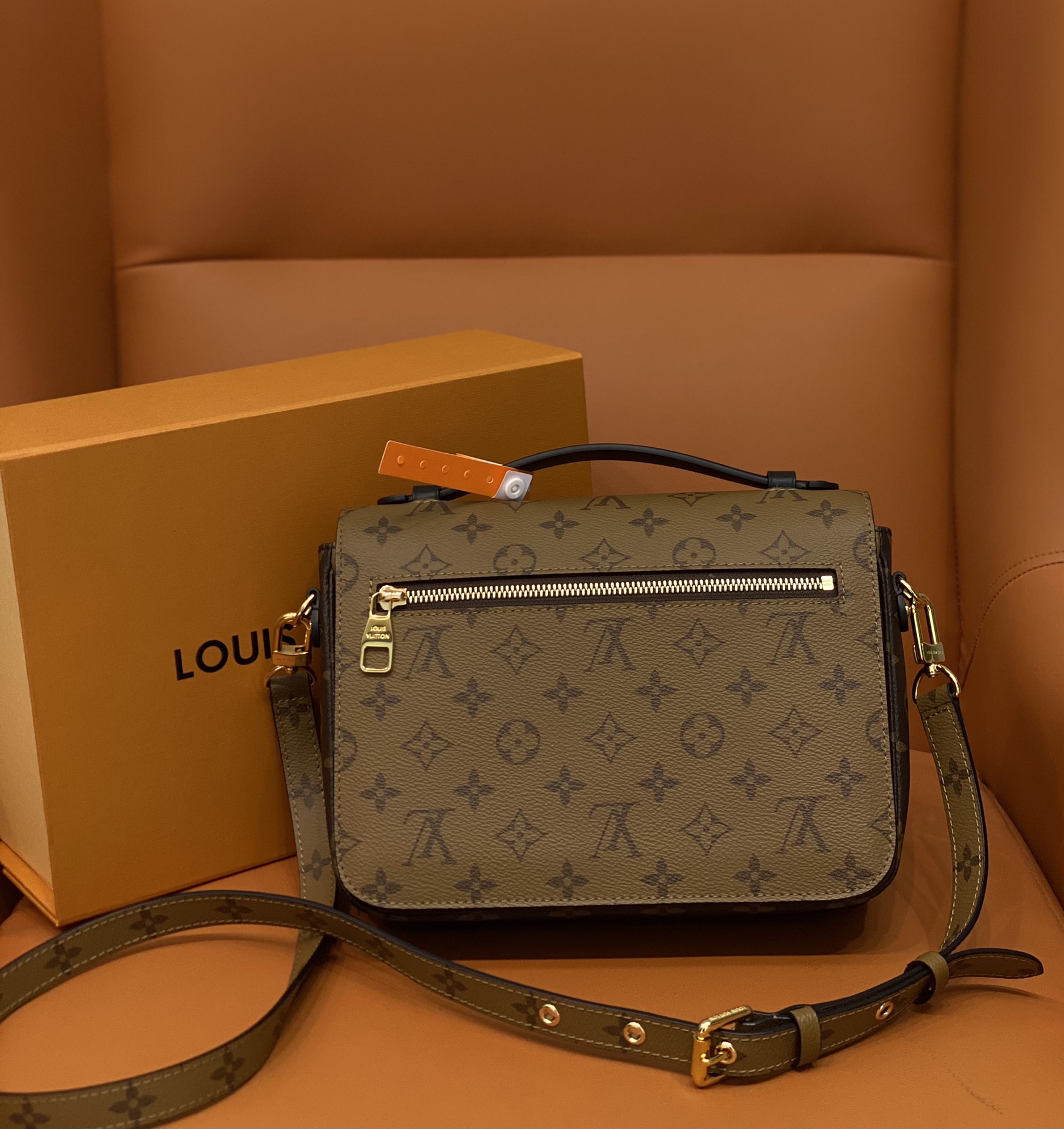 LOUIS VUITTON coated canvas with cowhide trim underarm shoulder ...