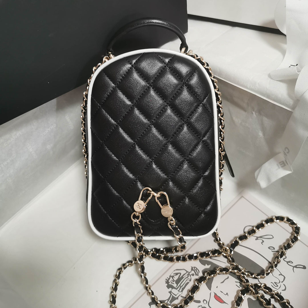 Chanel Black / White Quilted Lambskin Leather