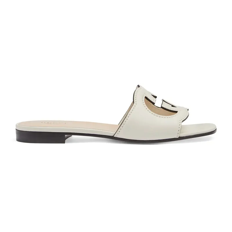 Gucci white flat bottom slippers