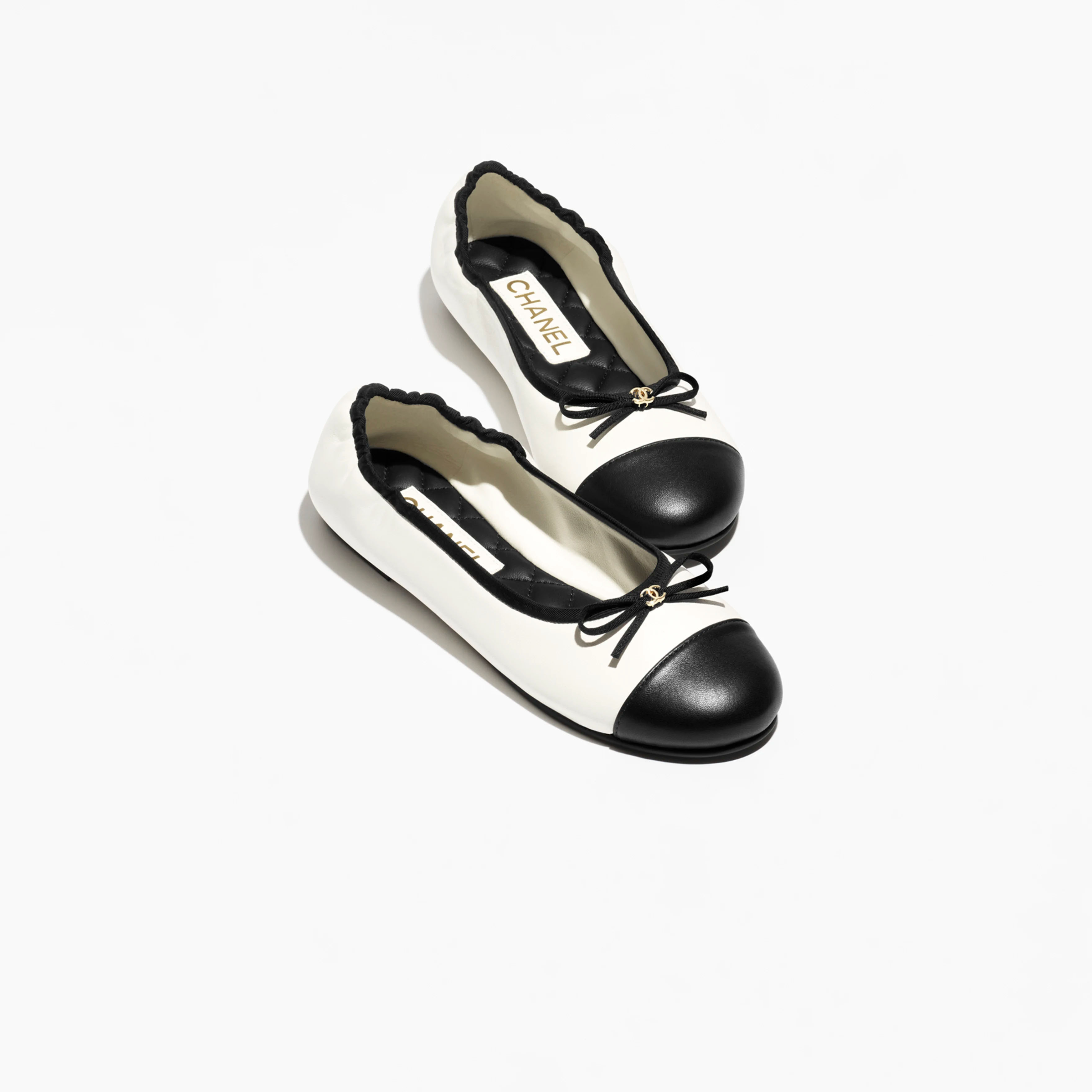 Chanel Early Spring Vacation Series Flat shoes White and Black Ballet Shoes