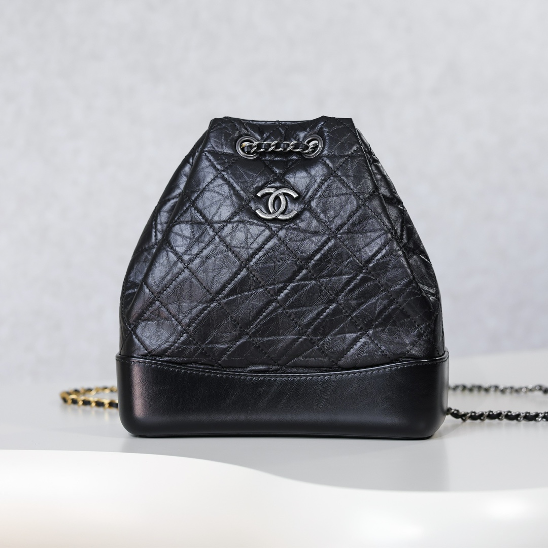 Chanel Black / Blue / White / Pink / Milk tea color Quilted Leather Backpacks