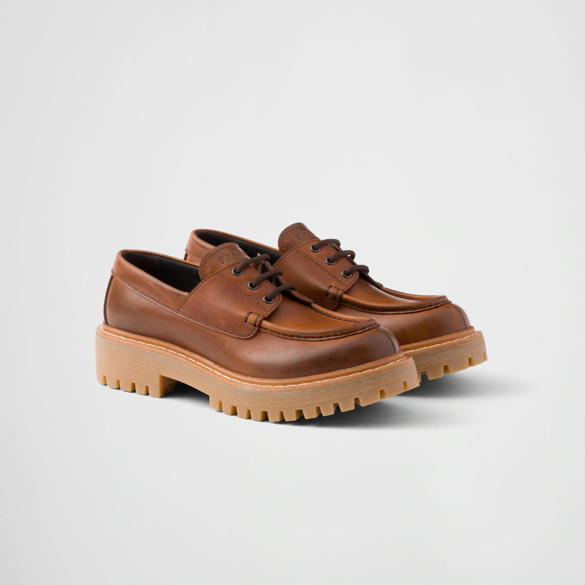 PRADA Lace-up leather loafers in cognac