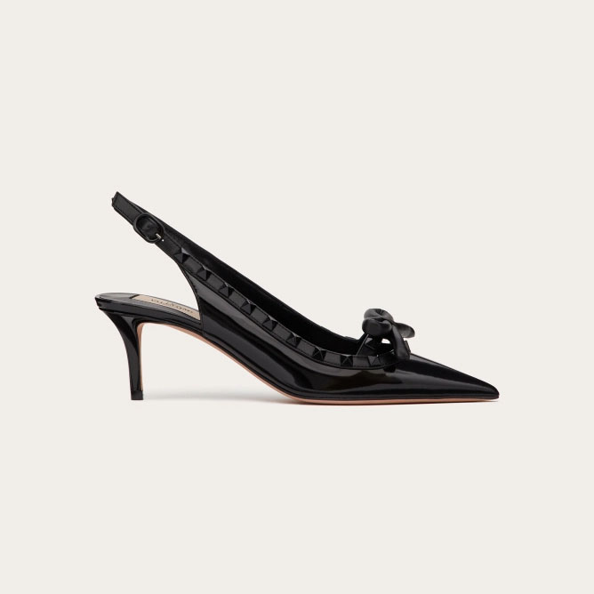 VALENTINO Lace-up heels in patent leather with rivet bow in the same color (heel height: 6cm)
