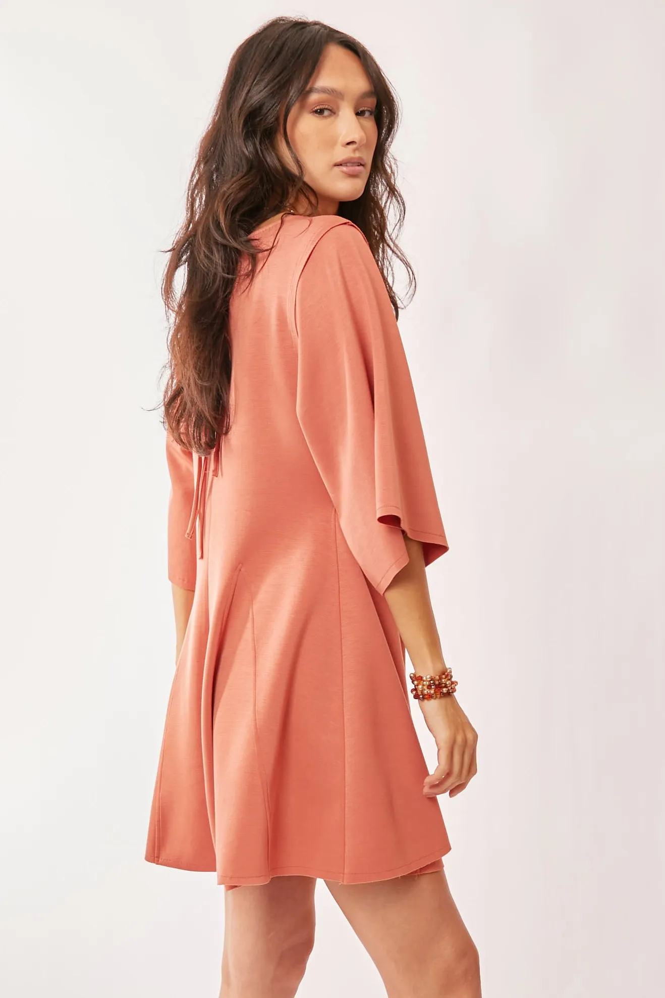 Davi & Dani Solid Draped Sleeve Ties Back Skort Romper