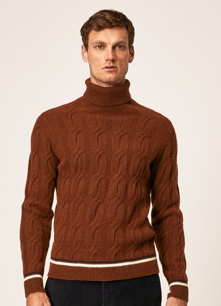 Cable knit roll neck jumper