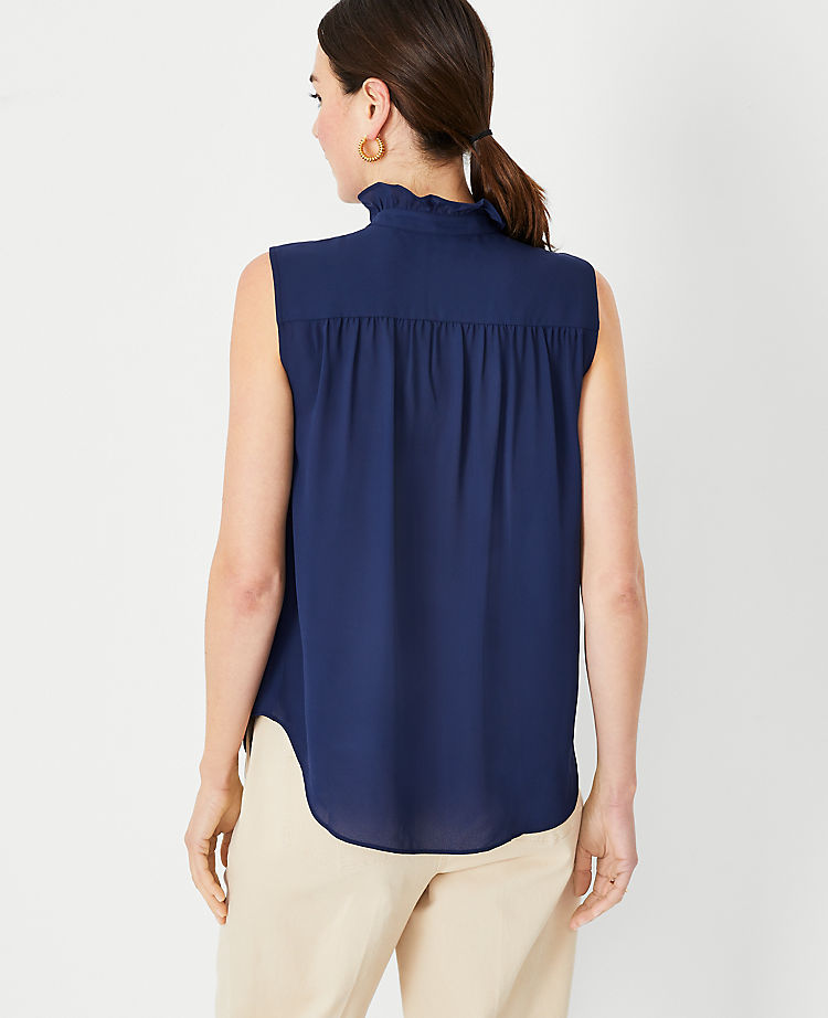 Ruffle Button Sleeveless Top