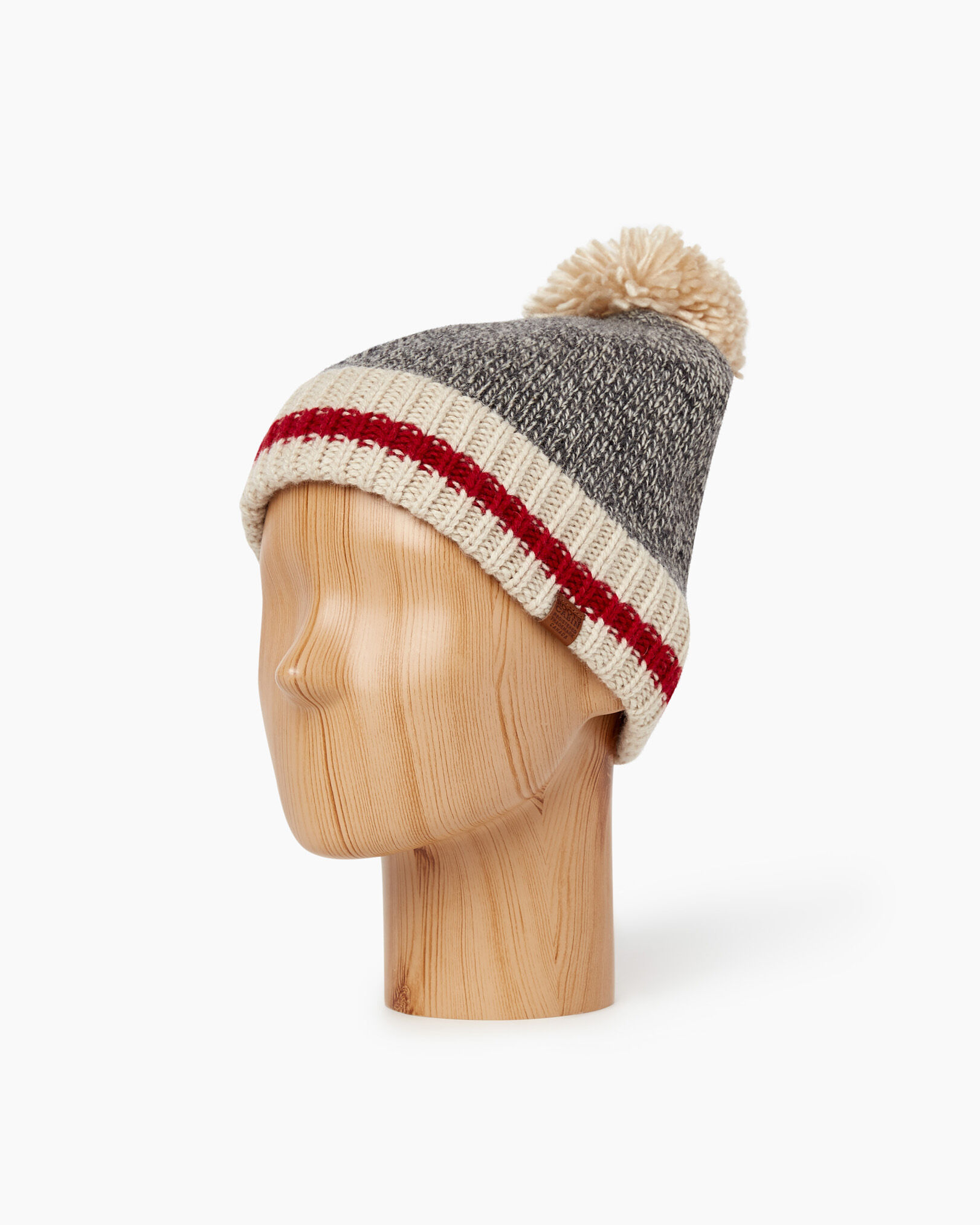 Roots Cabin Pom Pom Toque