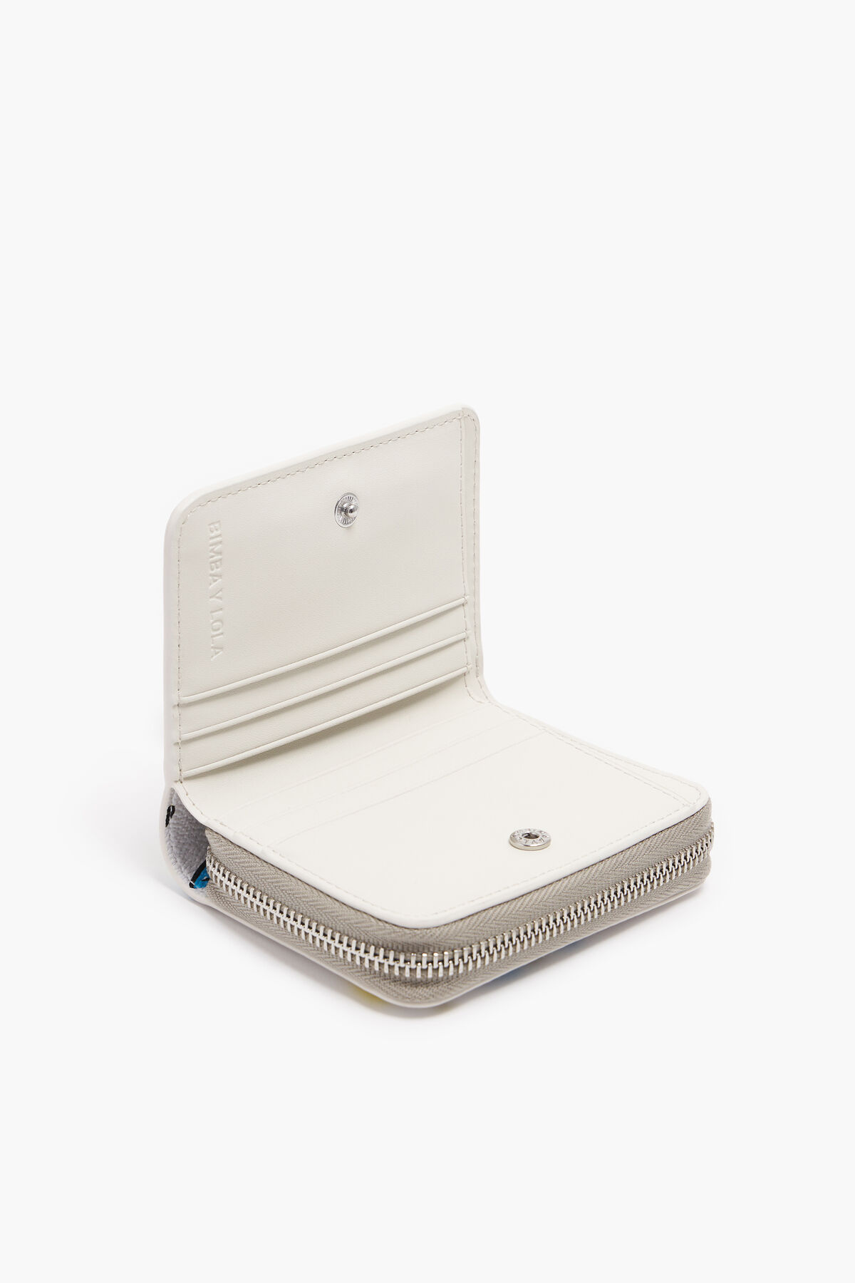 Cartera solapa textura print bananas blanca