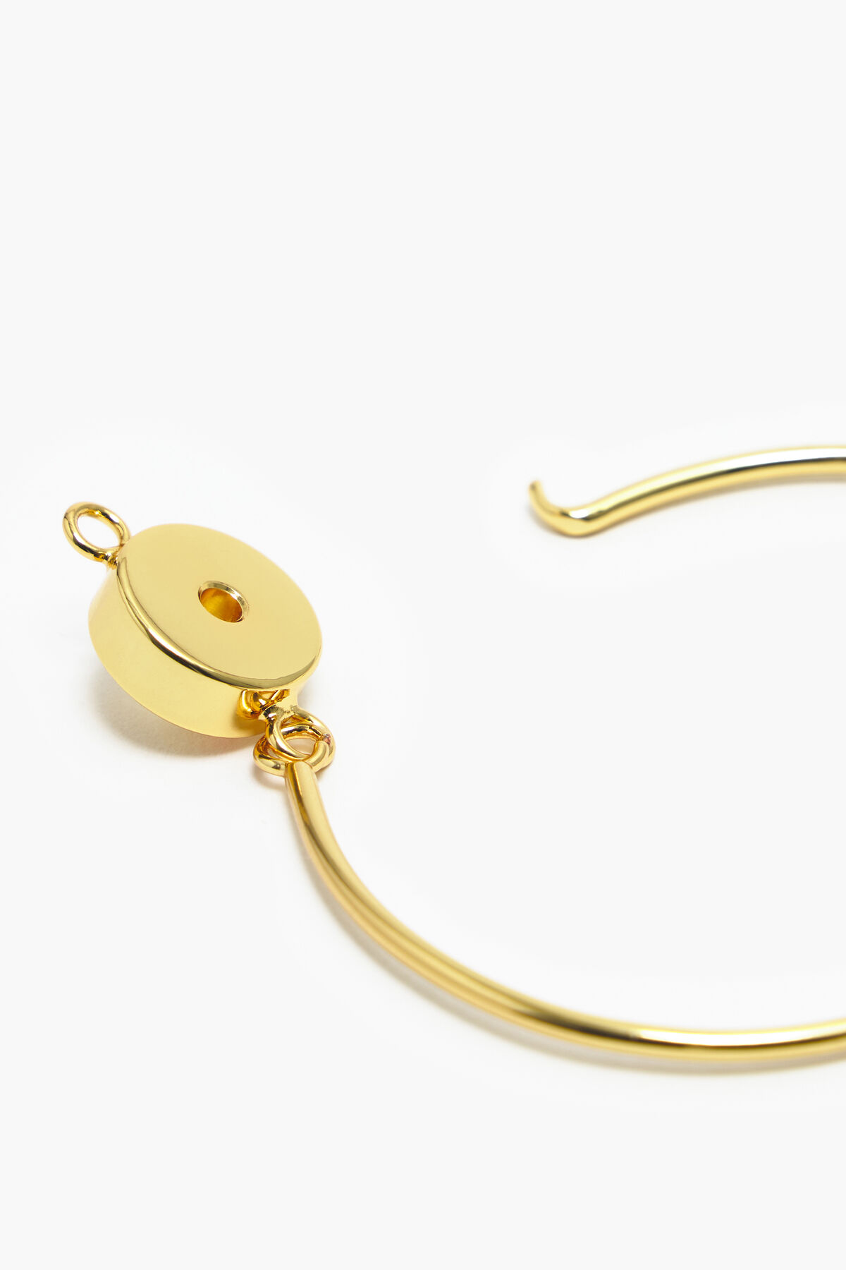 Pulsera rígida logo dorada