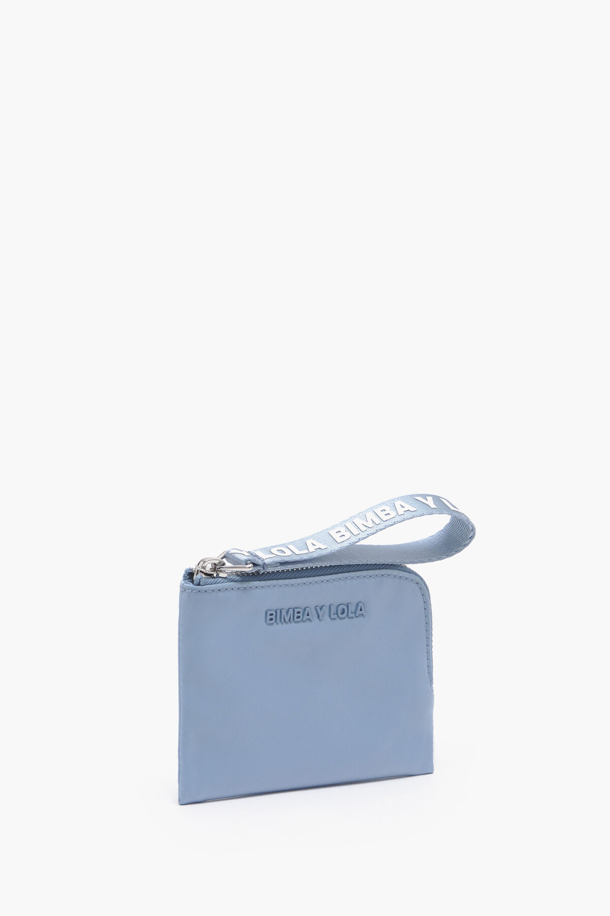 Monedero curvo nylon azul pastel