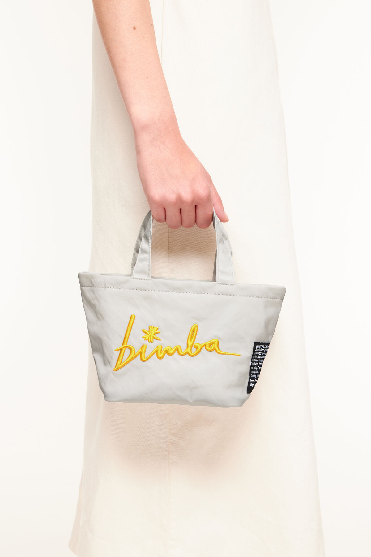 Minibolso trapecio nylon gris hielo