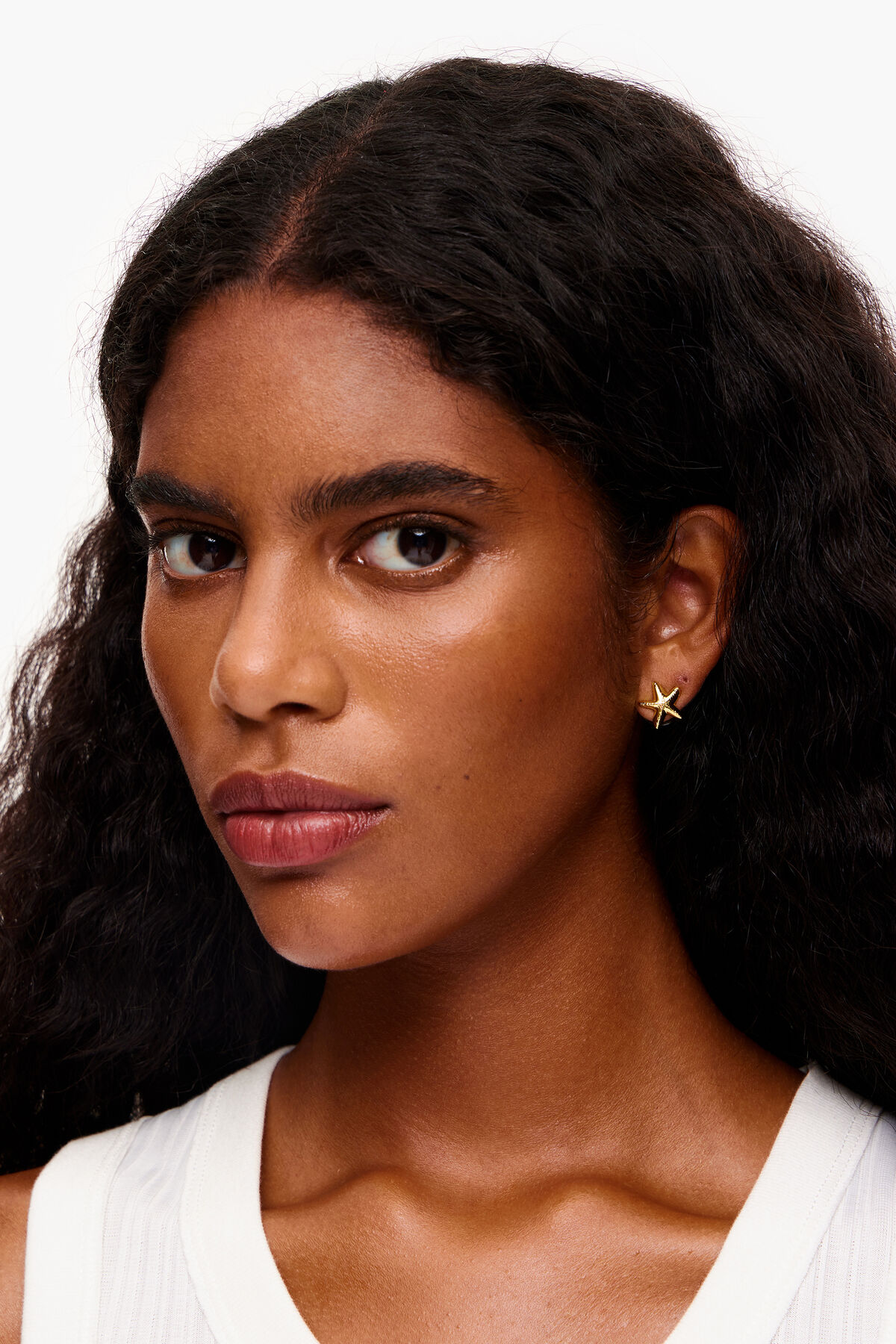 Pendientes pequeños estrella dorados