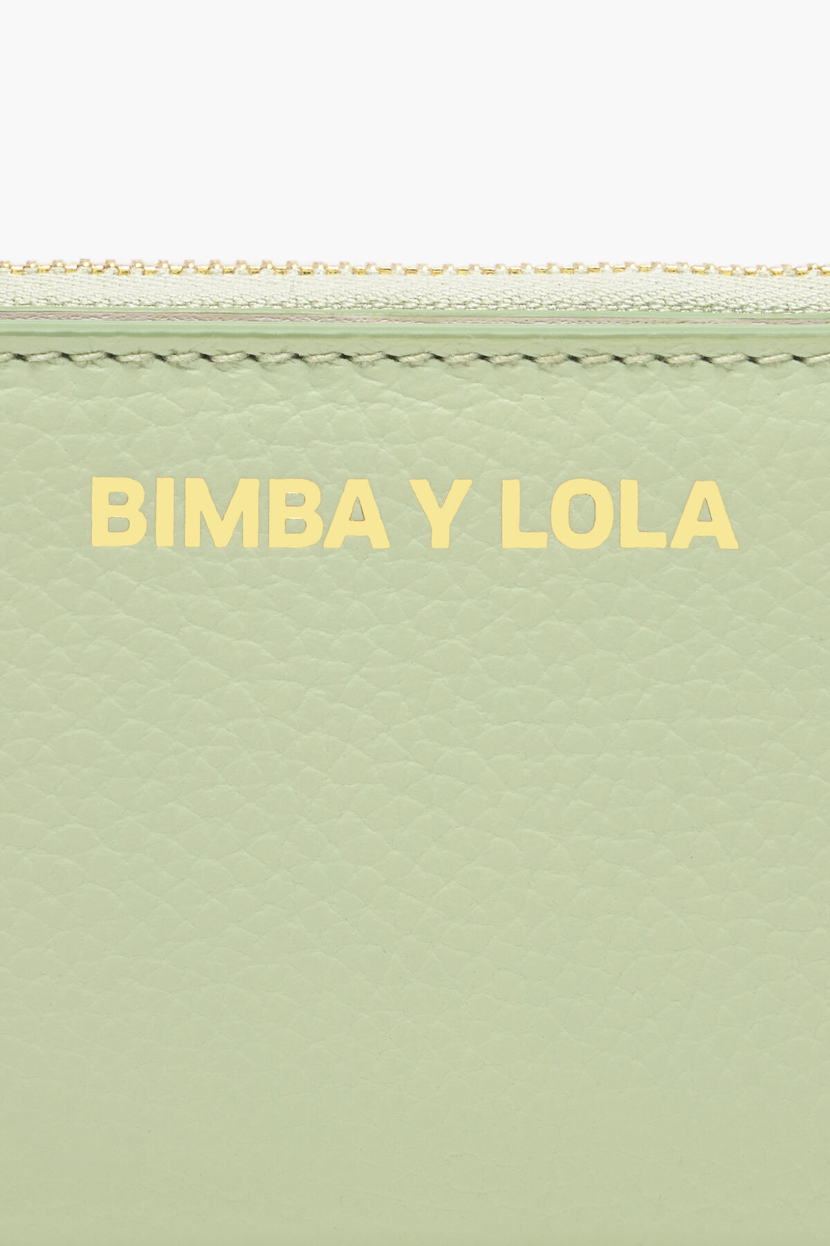 Cartera solapa piel verde pastel