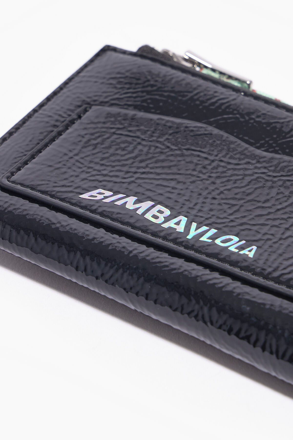 Monedero curvo charol negro