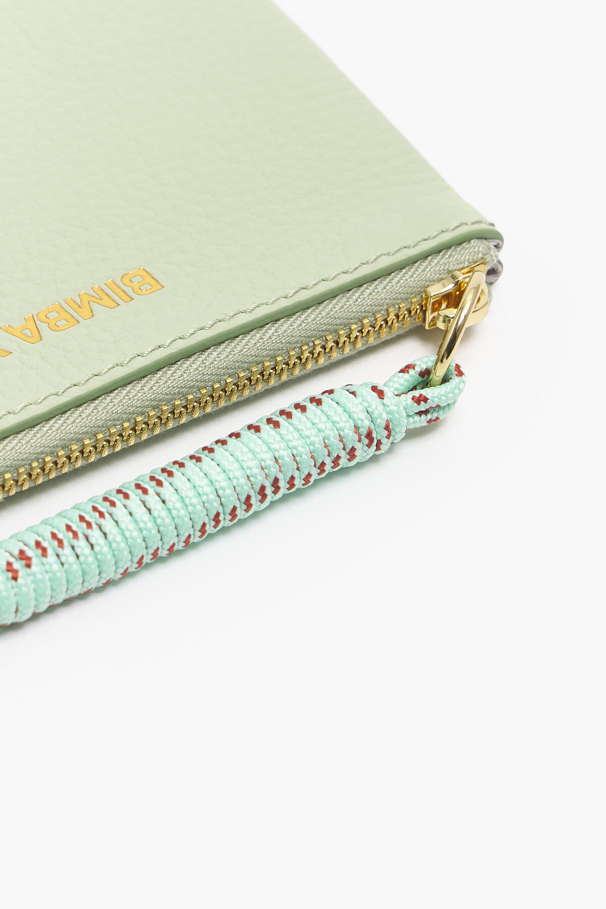 Monedero curvo piel verde pastel