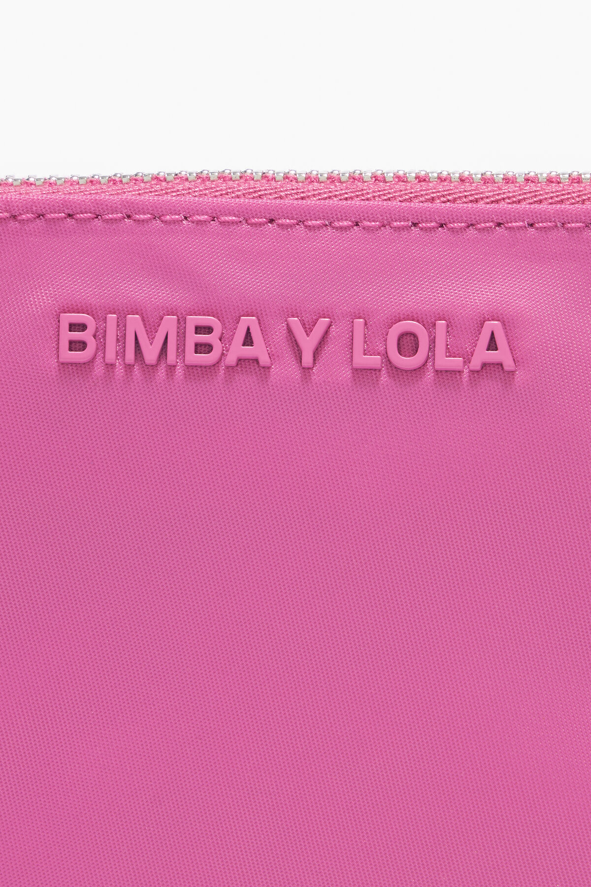 Monedero curvo nylon rosa