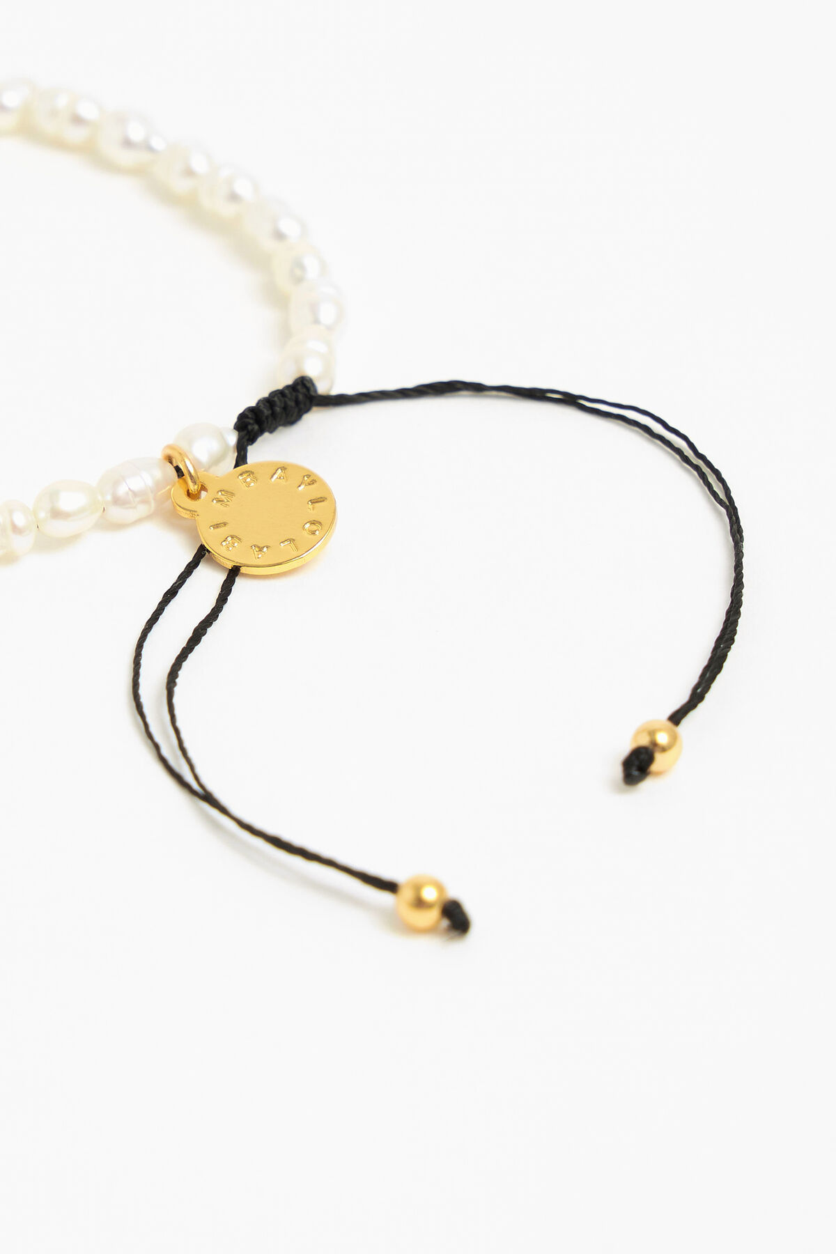 Pulsera letra A perlas