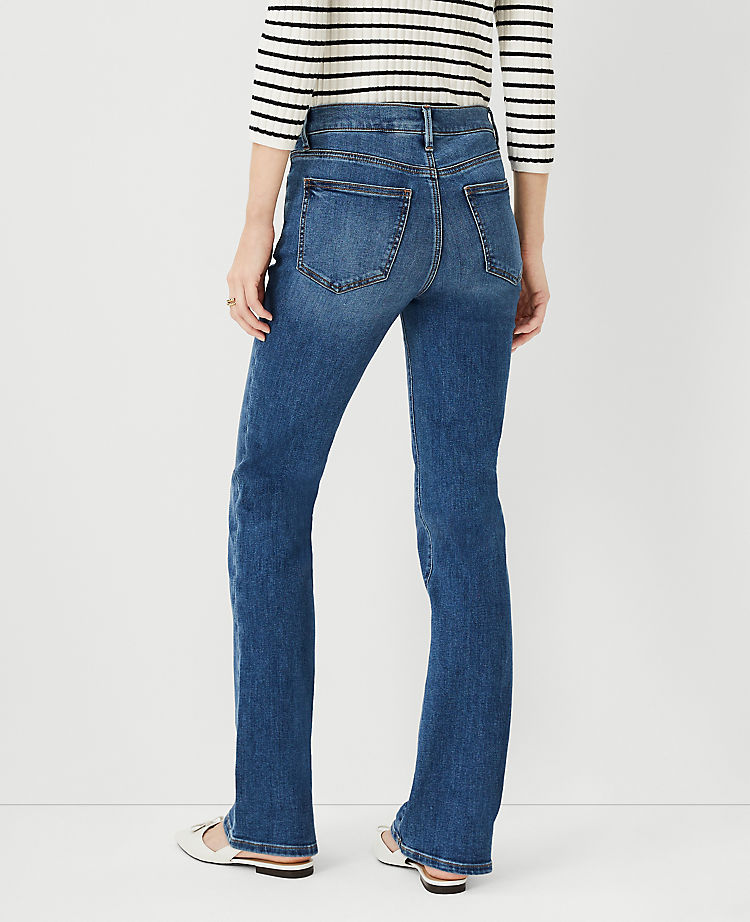 Sculpting Pocket Mid Rise Boot Cut Jeans in Mid Stone Wash