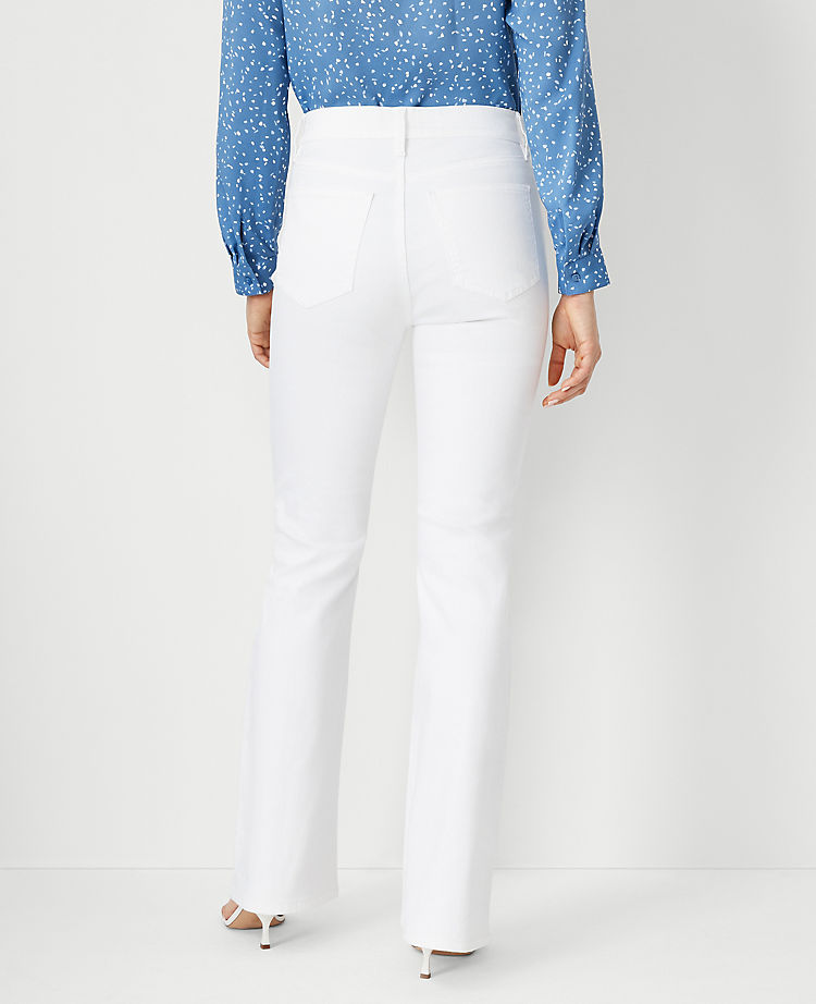 Curvy Sculpting Pocket Mid Rise Boot Cut Jeans in White