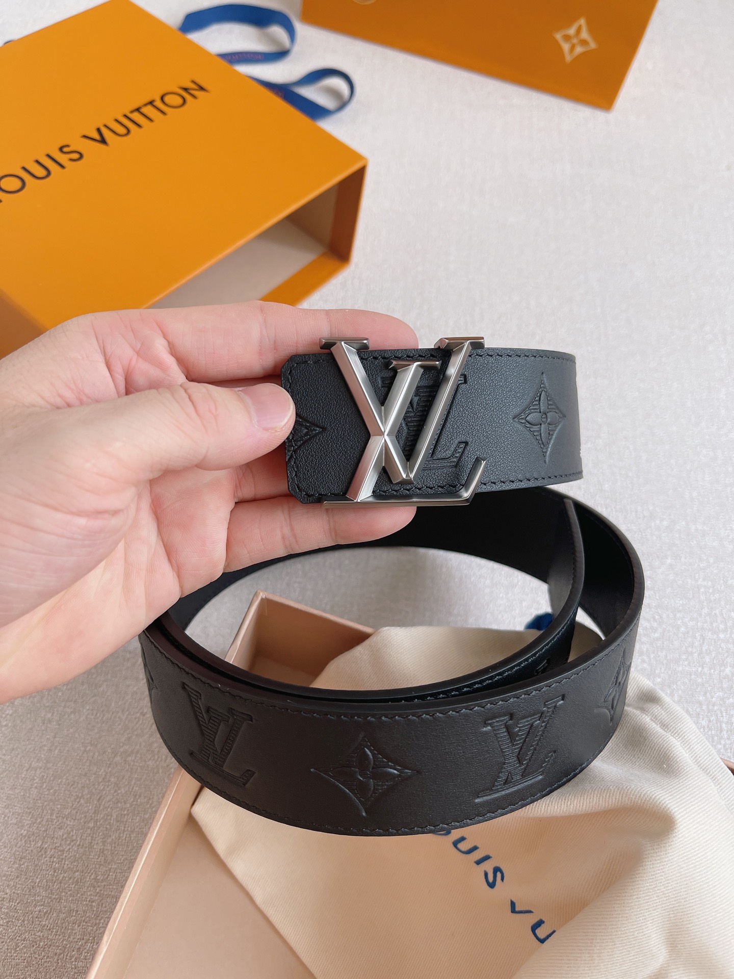 LOUIS VUITTO natural calfskin with Louis Vuitton signature design elements