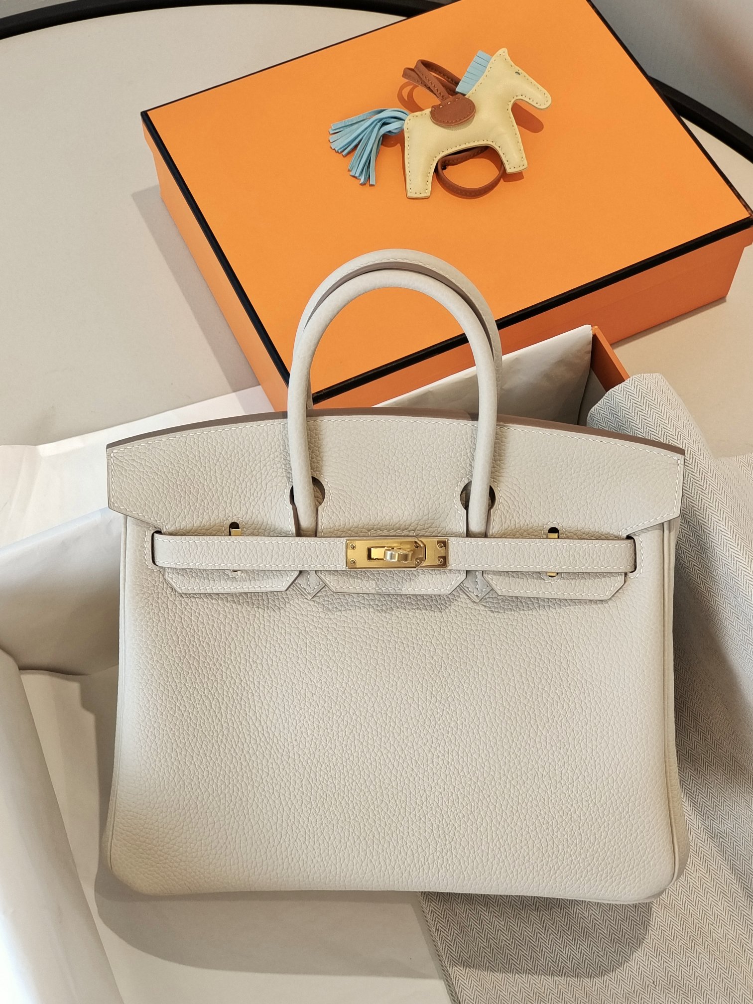 BK25 milkshake white togo leather gold buckle