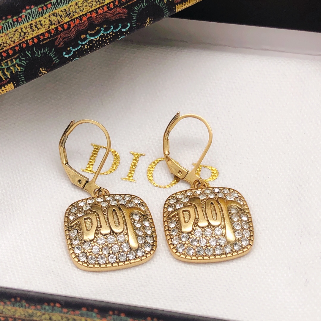 Dior stud earrings