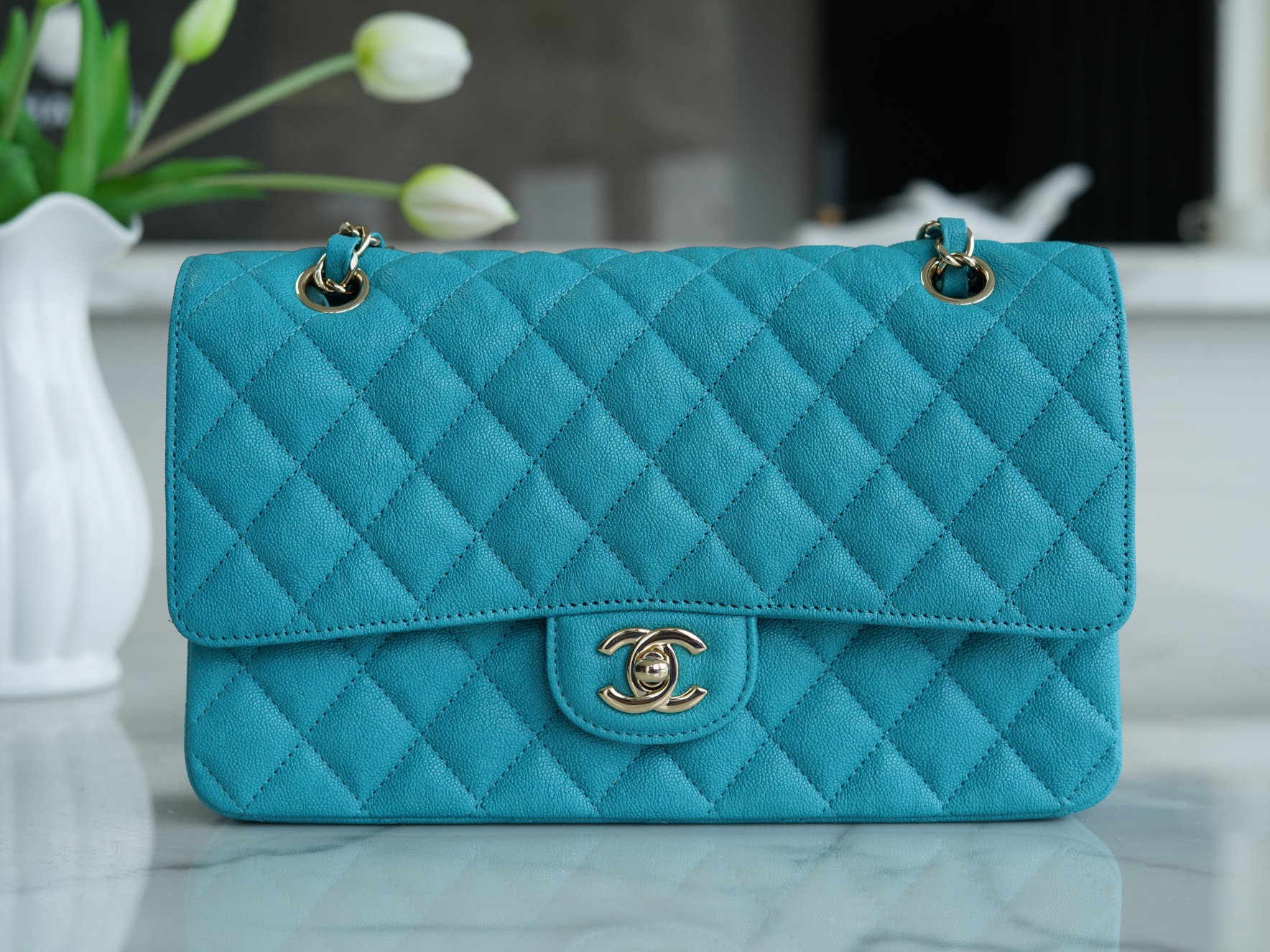 𝐂𝐇𝐀𝐍𝐄𝐋 Classic Flap washed cowhide is made from the most delicate newborn calves Washed fetal cow Medium Peacock Blue