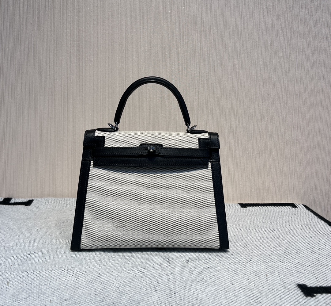 Kelly 25 canvas and swift leather second-hand bag