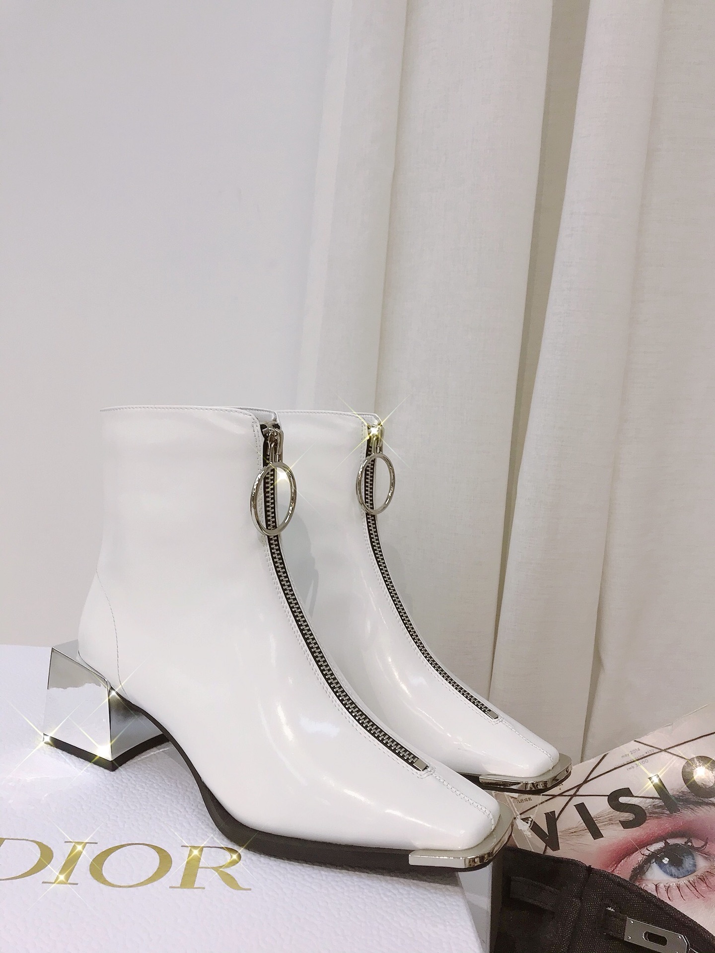 Lost in echo boots with large round buckle