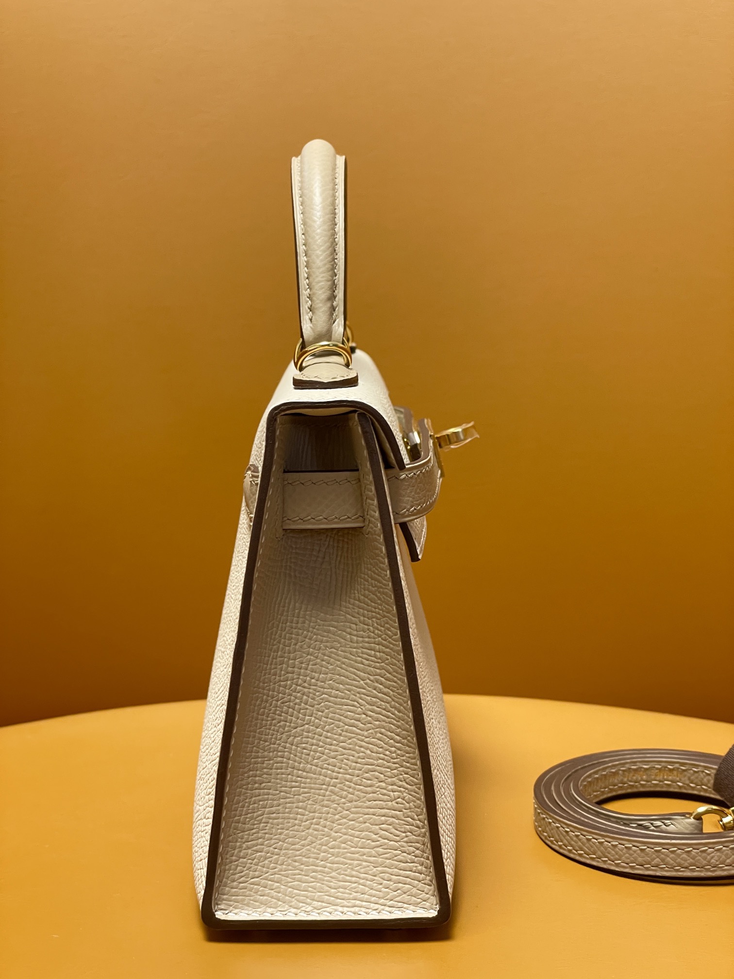 Mini Kelly second-generation milkshake white windbreaker gray epsom leather gold buckle