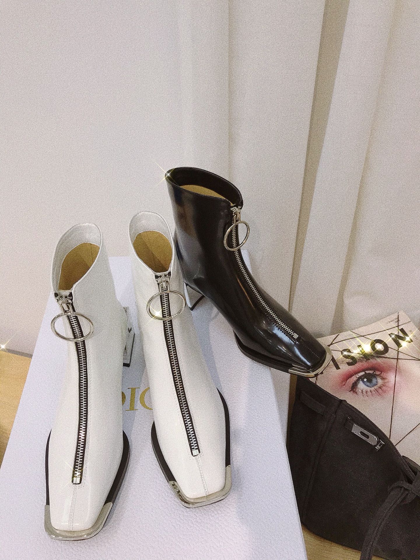 Lost in echo boots with large round buckle