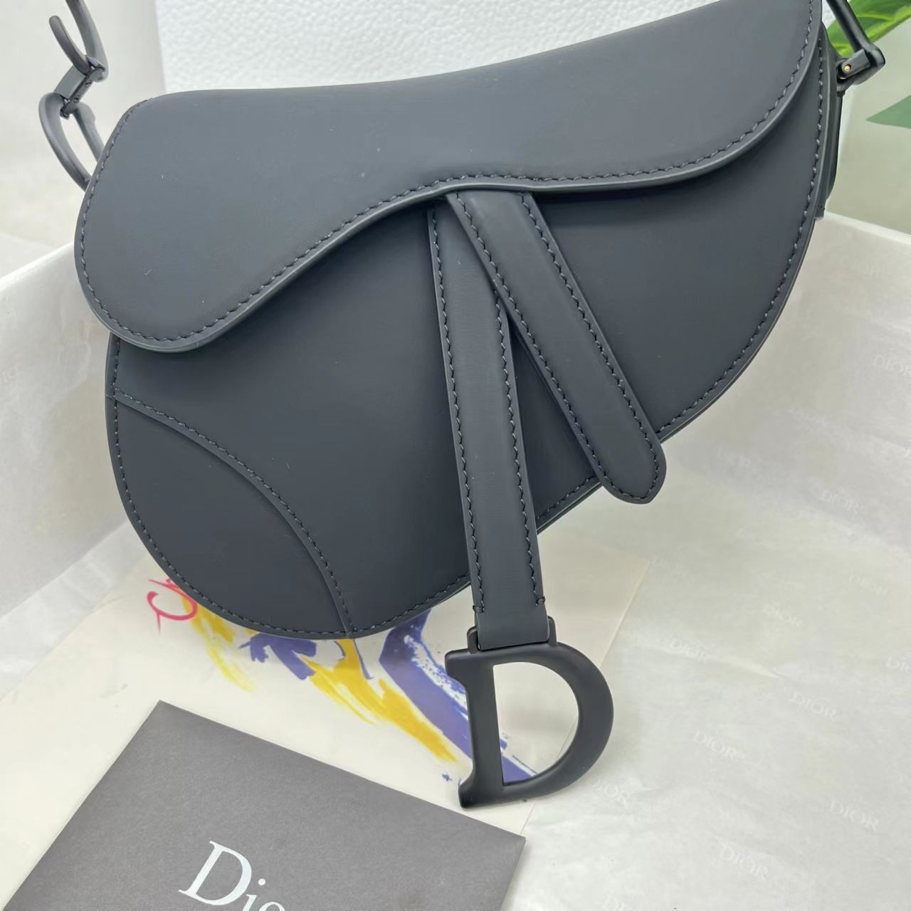 Dior saddle scrub series