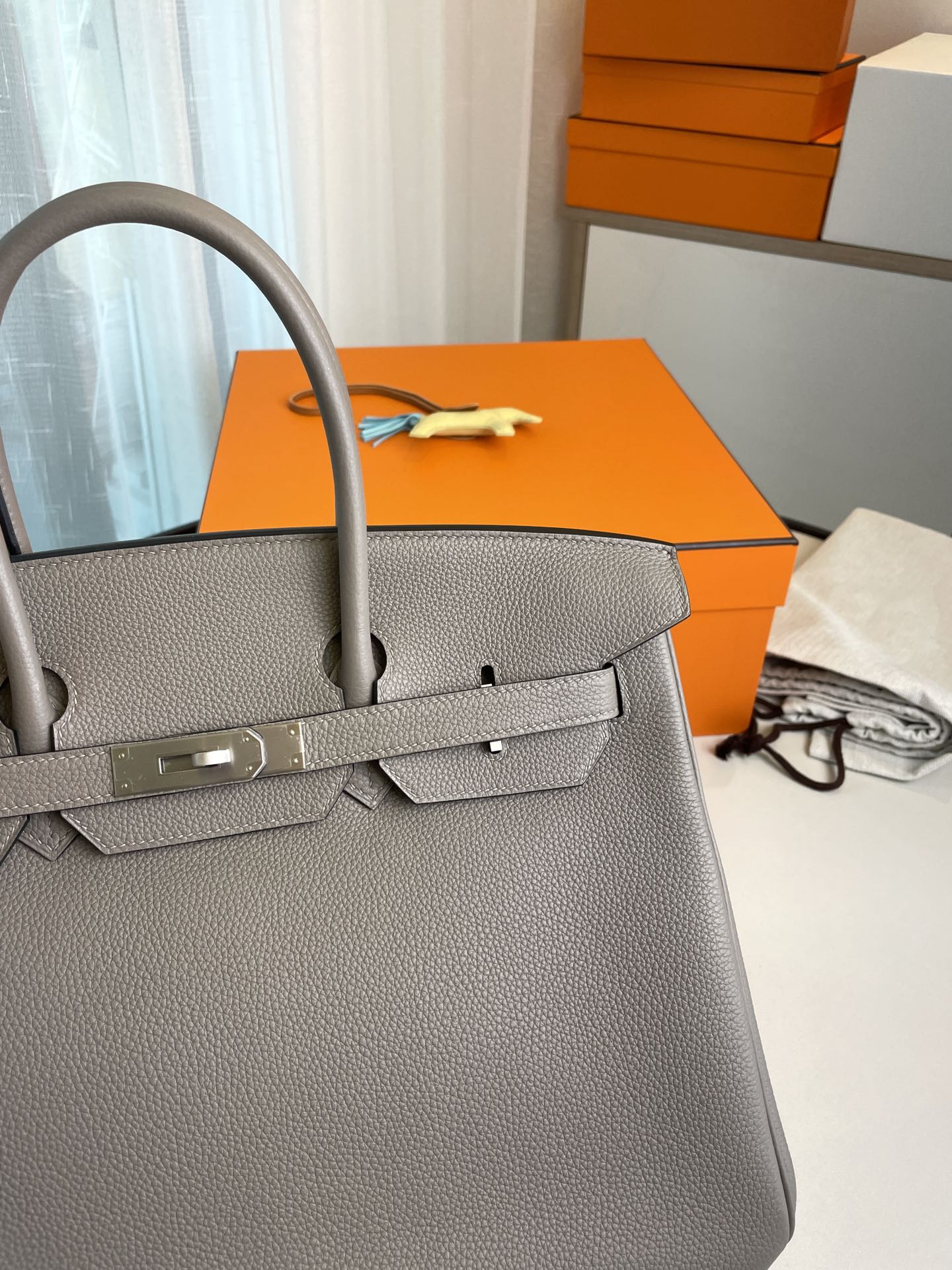 Bk35 asphalt grey togo leather with denim blue matte silver buckle