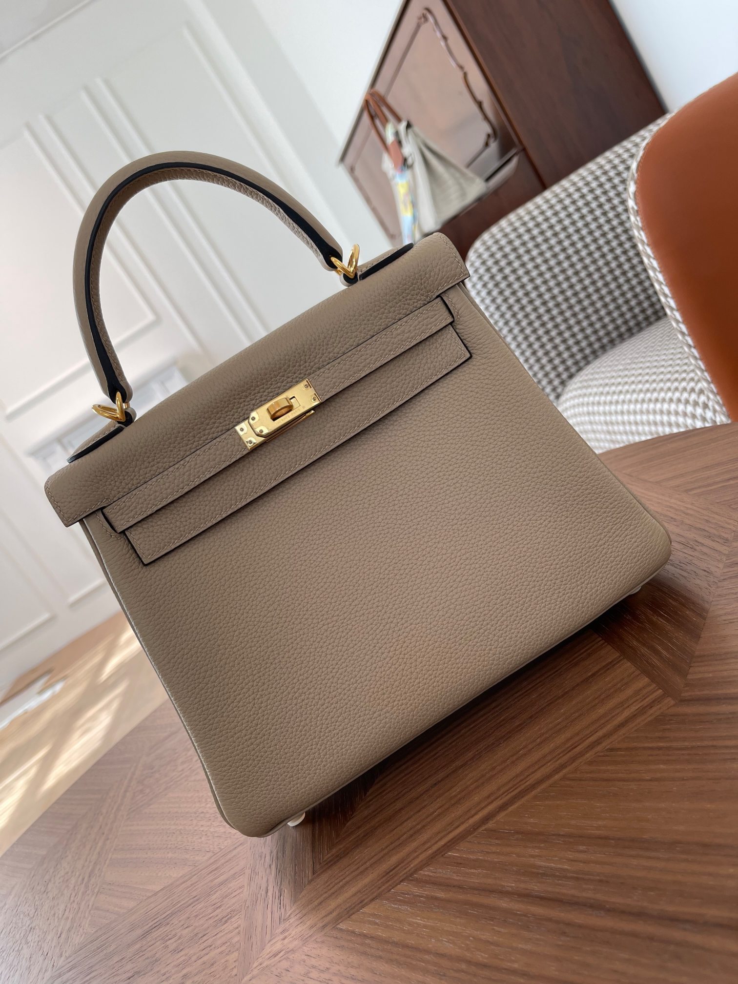 Kelly25 trench coat gray togo leather gold buckle