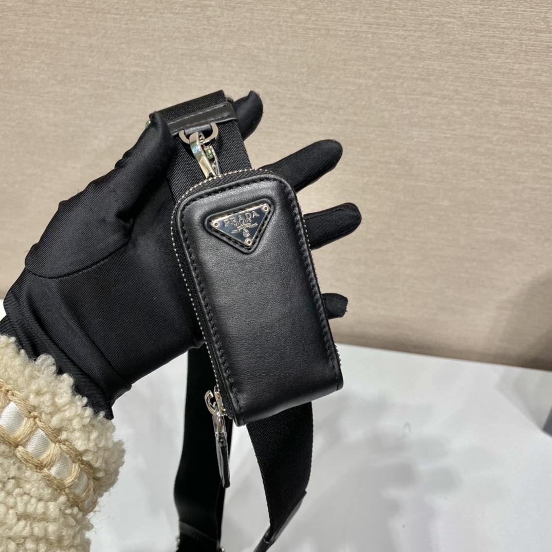 𝐏𝐑𝐀𝐃𝐀 Triangle Crossbody Bag 1BH190
